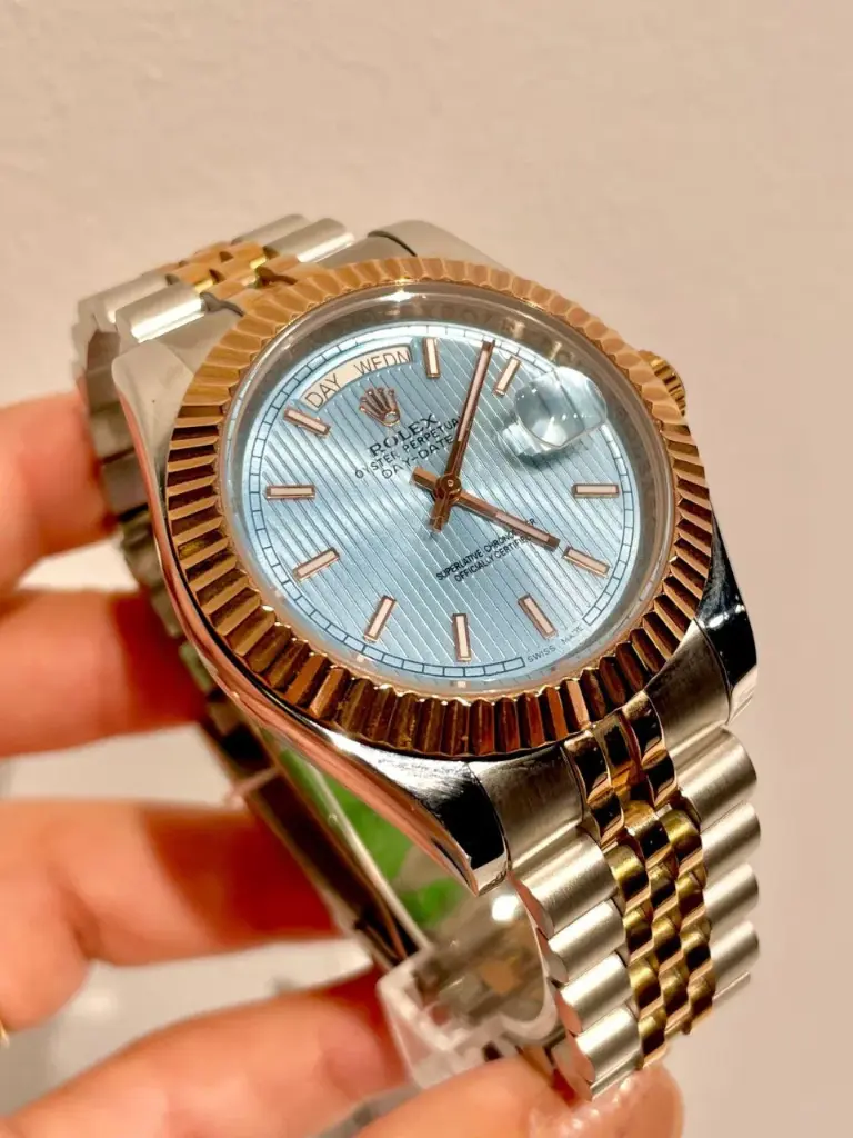 Rolex Day-Date wristwatch featuring a two-tone rose gold and stainless steel design-69