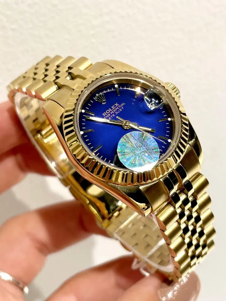 Rolex Datejust watch featuring a blue-24