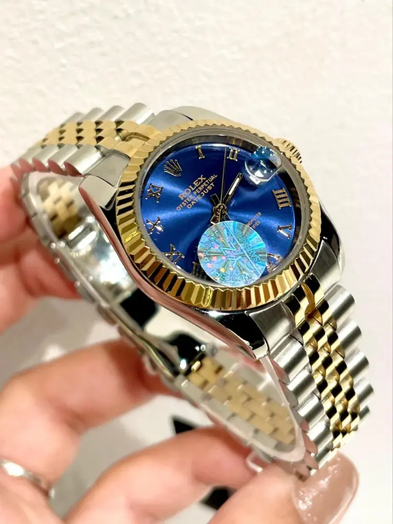 Rolex Datejust featuring a blue-33