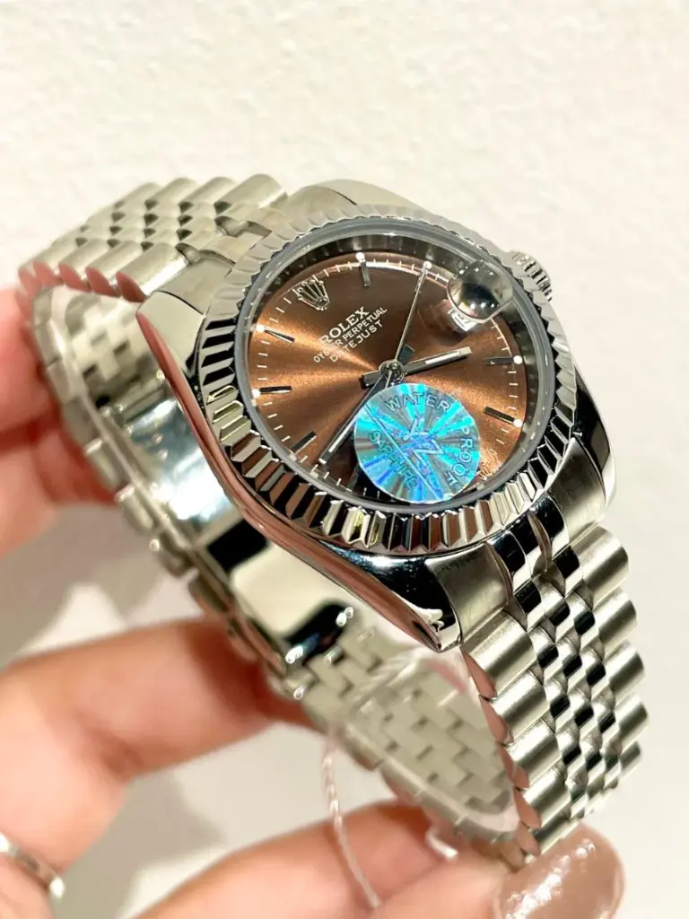 Rolex Datejust watch featuring a distinctive chocolate -44