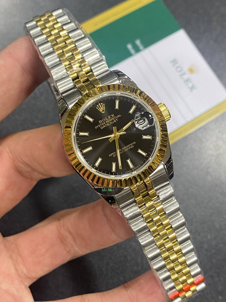 Rolex Datejust featuring a black-51
