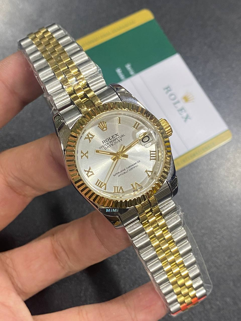 Rolex Datejust wristwatch featuring a silver dial with-57