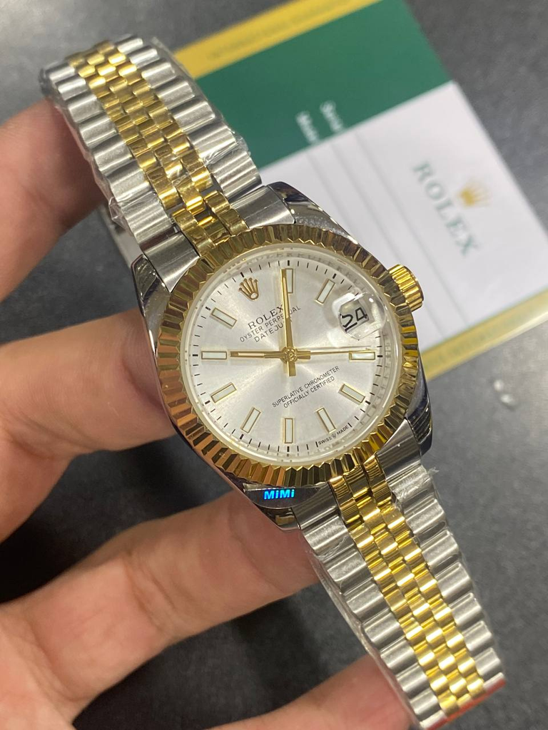  Rolex Lady-Datejust with a silver dial, fluted bezel-58