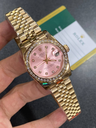 Rolex Lady-Datejust watch featuring a pink -65