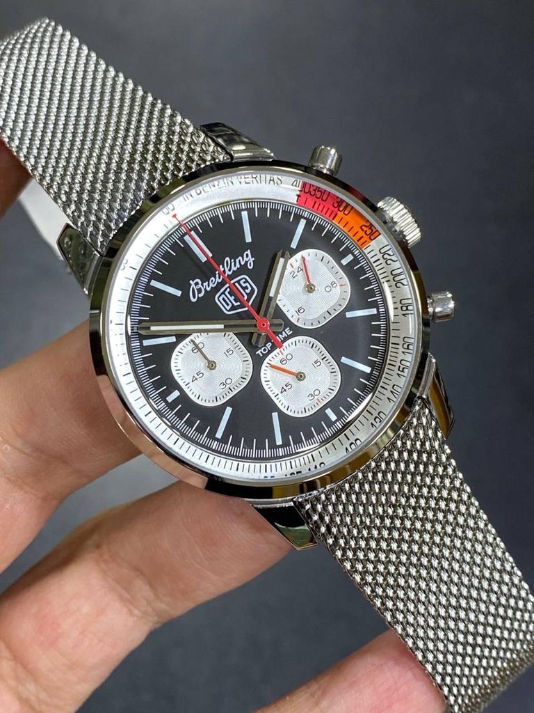 This is a Breitling Top Time B01 Deus chronograph -72
